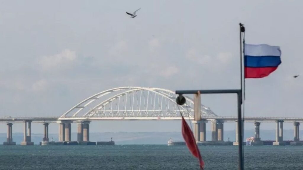 A view taken on October 14, 2022, shows the Kerch Bridge that links Crimea to Russia, which was hit by a blast on October 8, 2022. Moscow has accused Ukraine of repeatedly striking the Chonhar Bridge, linking Kherson and Crimea, and the Kerch Bridge.